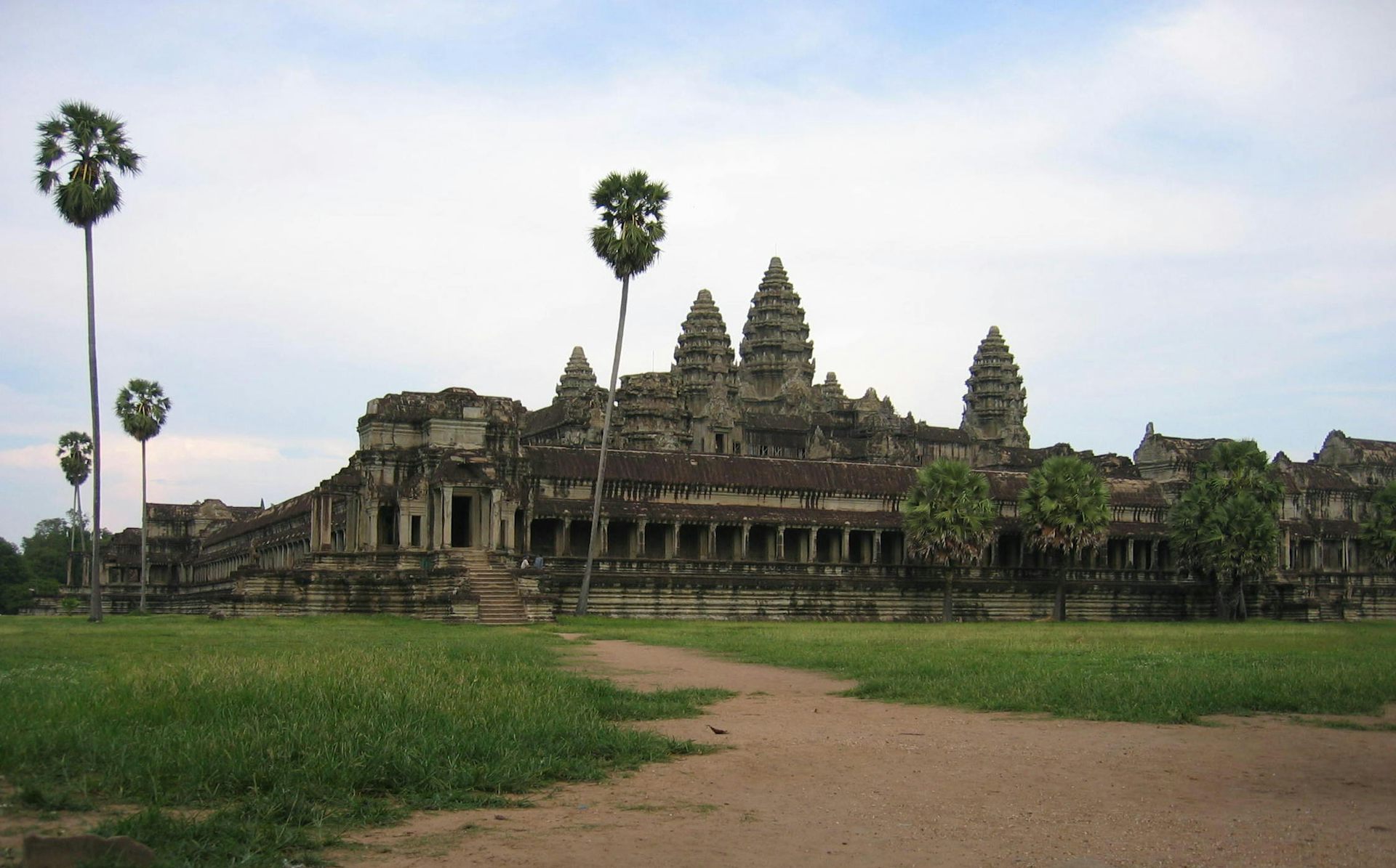 Angkor Wat temple with palm trees